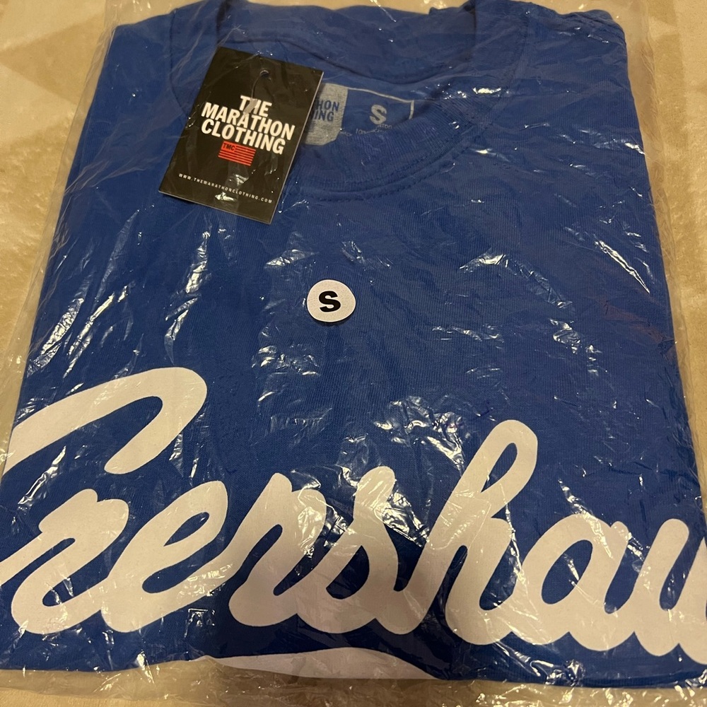 Blue and white Crenshaw T-shirt. The marathon clothing.